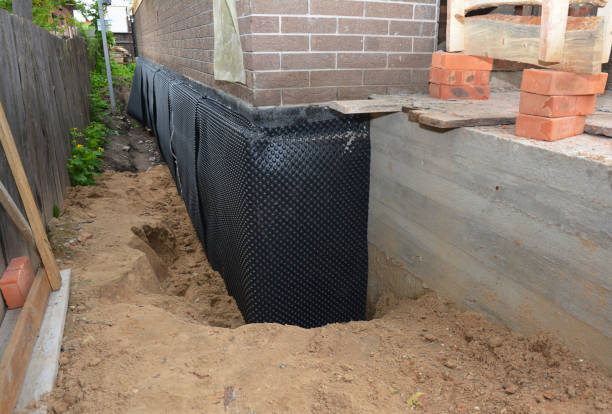 SJ Waterproofing Pros technician performing targeted Emergency Waterproofing assessment in Haslett, MI